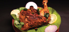 TANDOORI CHICKEN IS SERVED IN THE BANANA LEAF